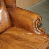 Captain's chair Chesterfield vintage leather with tufted wingback.