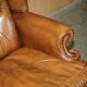 Captain's chair Chesterfield vintage leather with tufted wingback.
