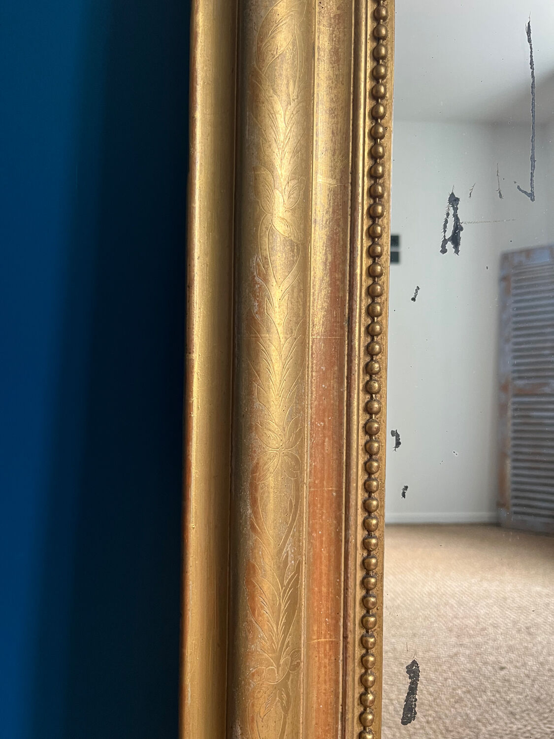 Old mirror Louis-Philippe beaded 128cm/95,cm gilded with gold leaf