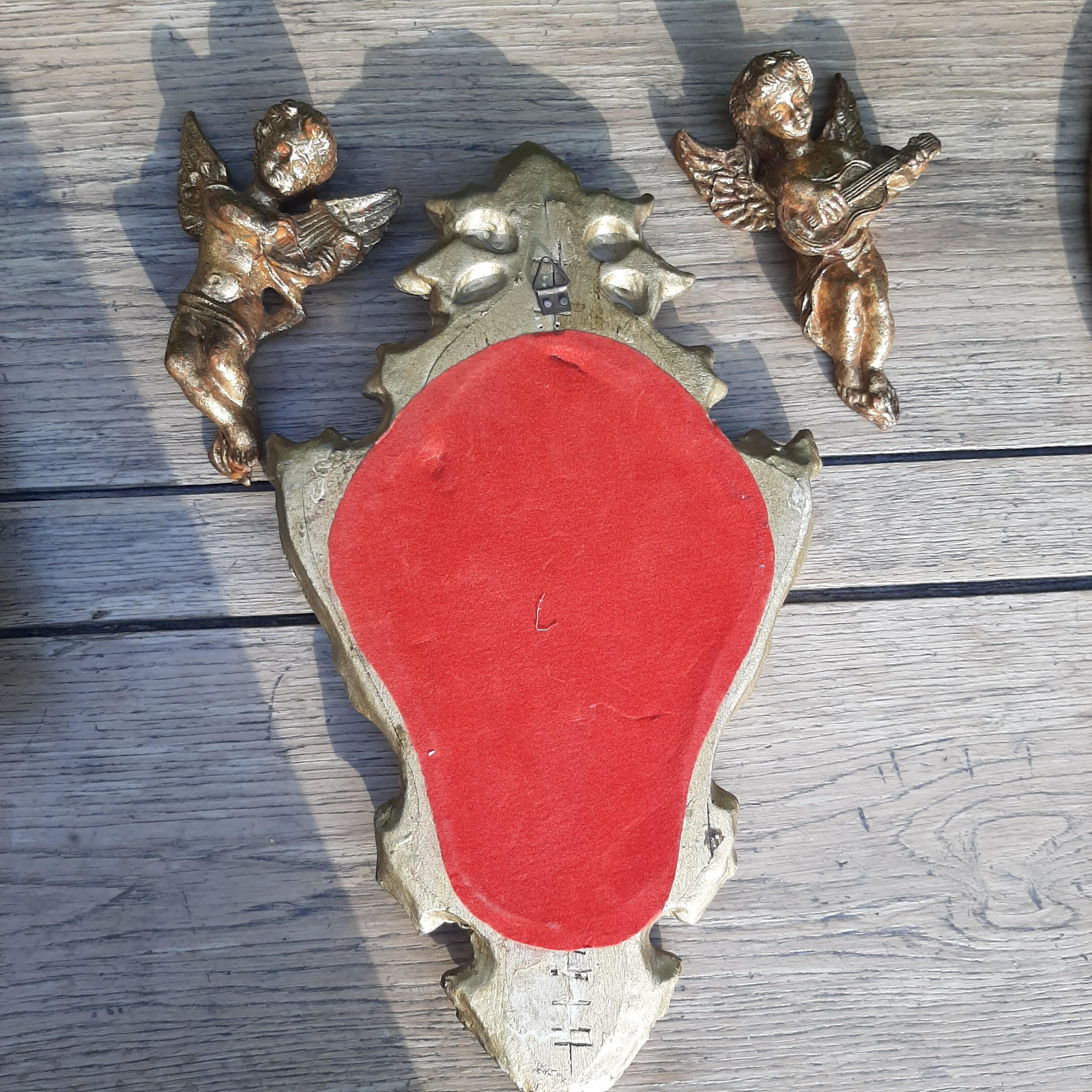 Miroir baroque bois doré et 2 angelots
