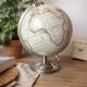 Decorative terrestrial globe on silver metal stand – explorer style