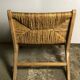 Low armchair in raw teak with seat and mulched backrest