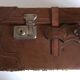 suitcase of leather with labels of palaces