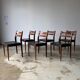 Set of 6 Scandinavian design chairs in solid teak and black Skai.