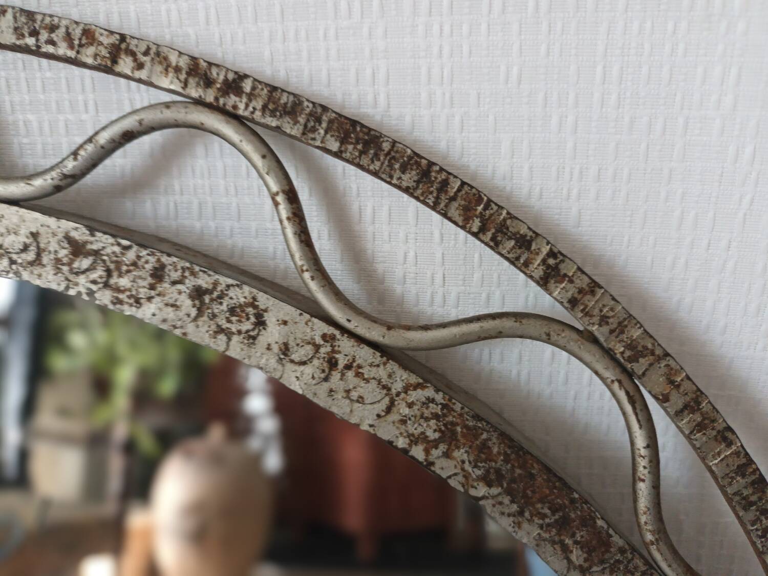 Hammered iron Art Deco mirror