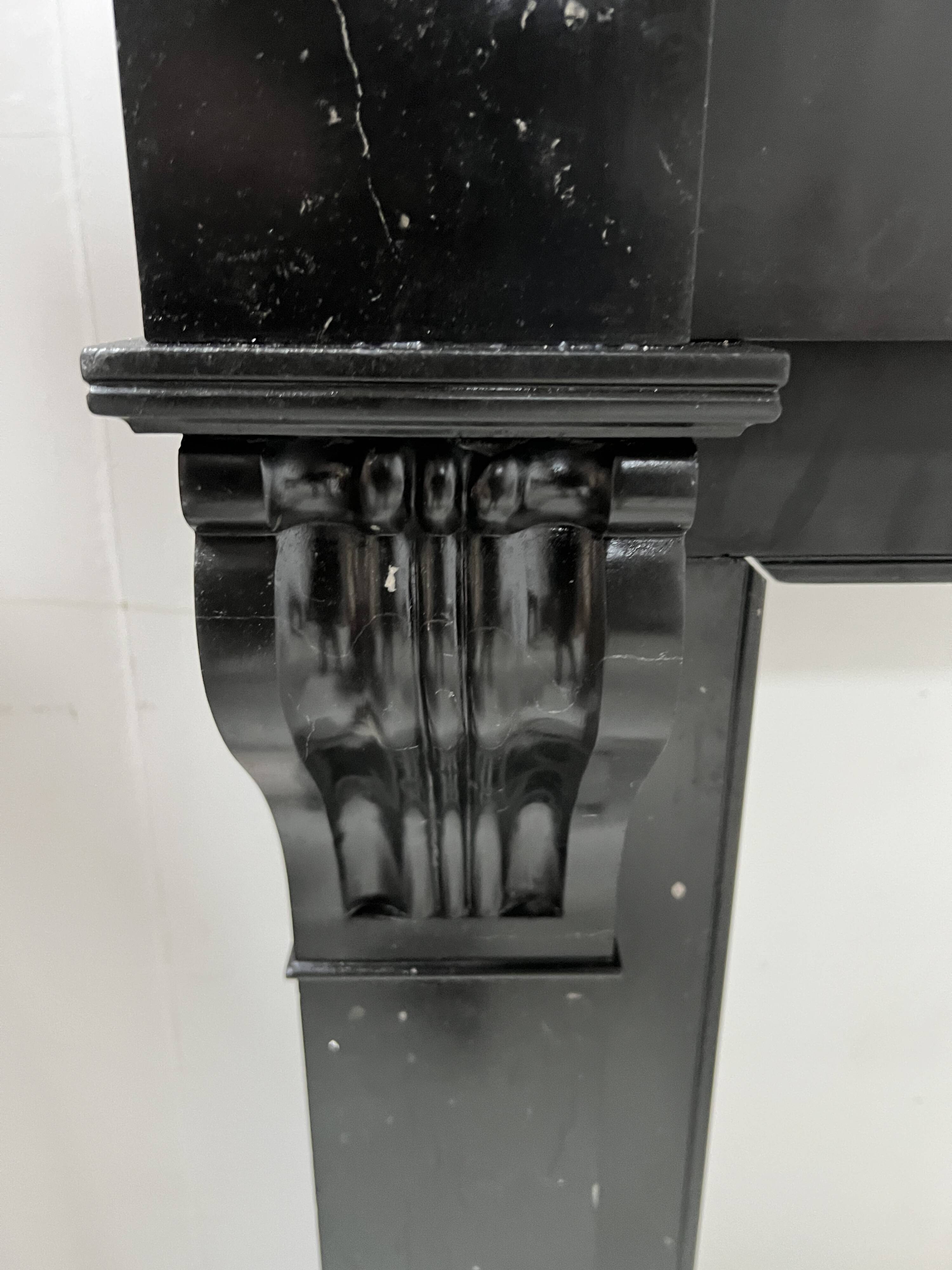 Napoleon III fireplace with a black marble corbel, 19th century.