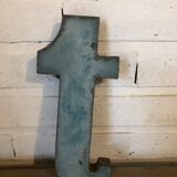 Blue sign letter "T"