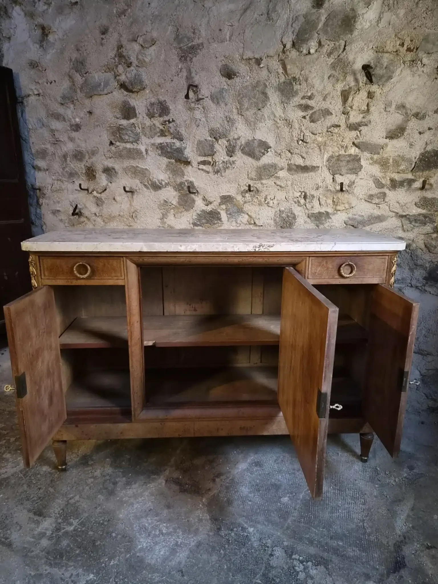 Antique Louis XVI style buffet in burr elm with marble top, late 19th century.