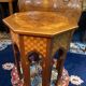Thuyawood tea table with marquetry decoration.