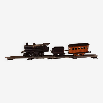 Small JEP mechanical train, including locomotive, tender, sleeping car, rail, 1930s