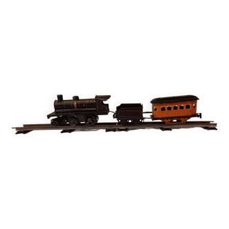 Small JEP mechanical train, including locomotive, tender, sleeping car, rail, 1930s