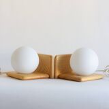Duo of pine and opaline glass wall lights, 1980s