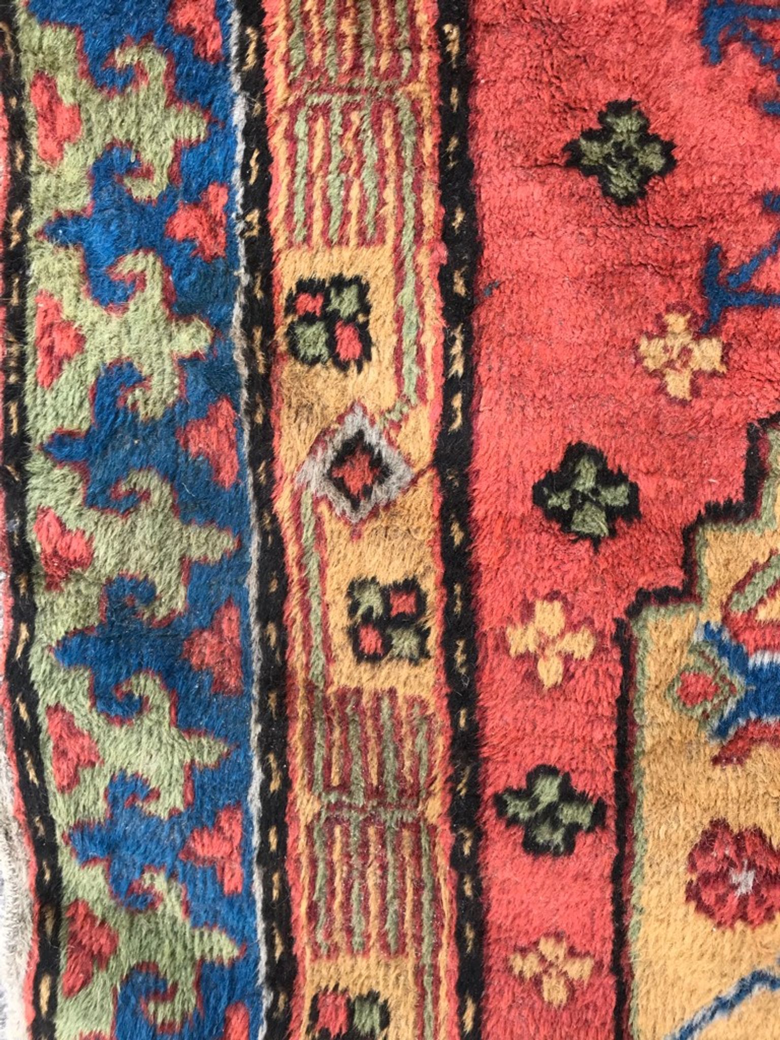 Old sinkiang oriental rug handmade 68 x 139 cm