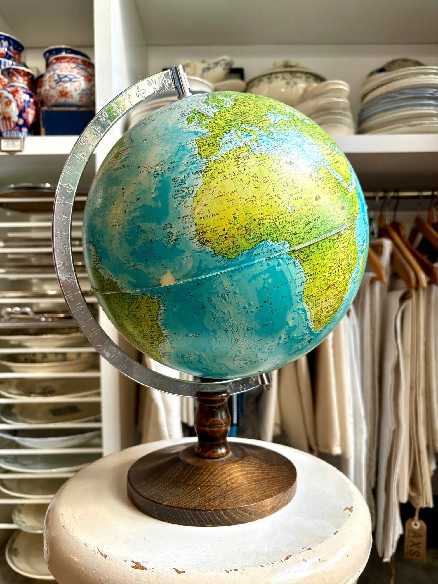 World map, globe with wooden base