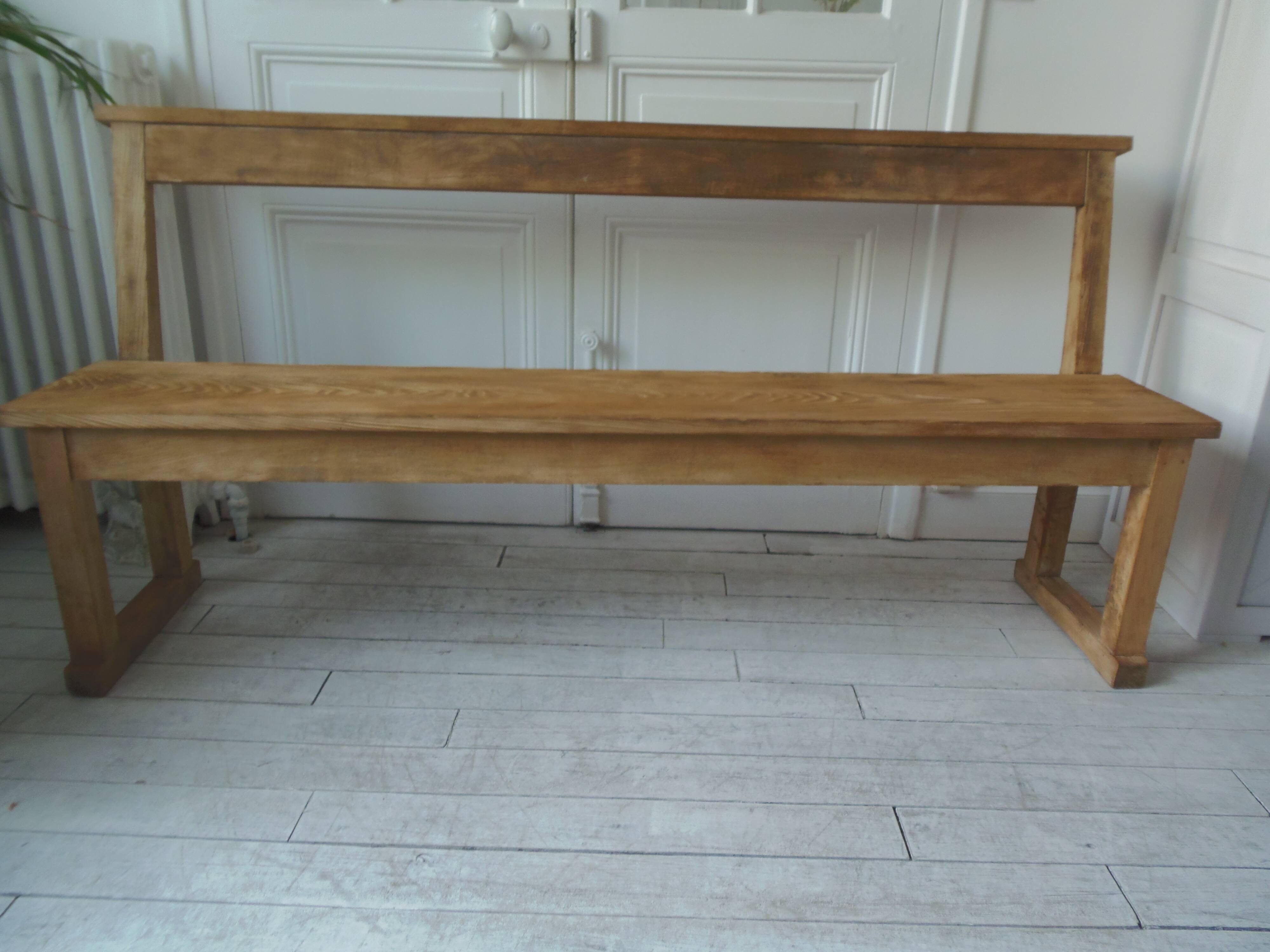 Church bench, bed end in pitch pine with light oak wax finish.