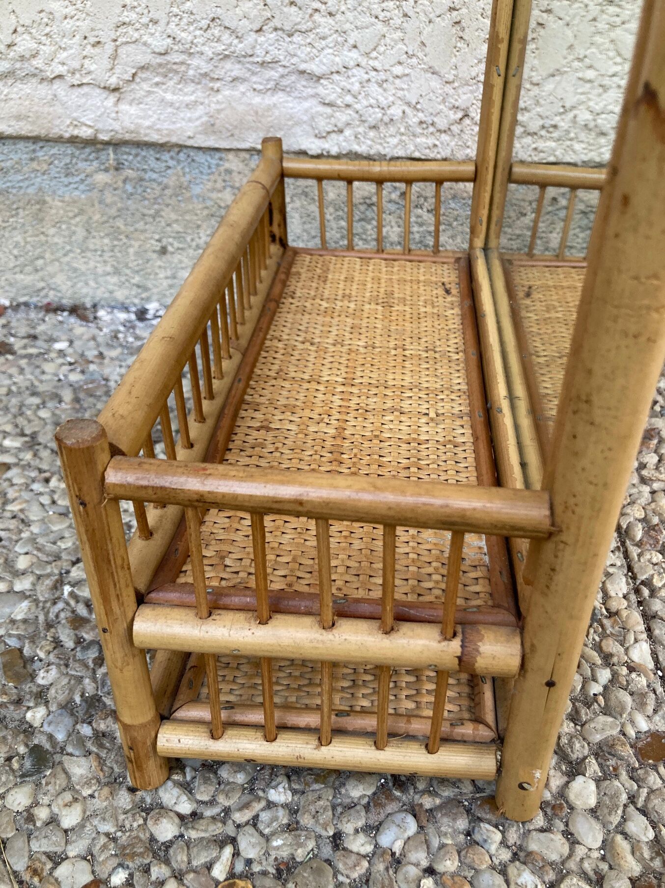 Vintage rattan wall shelf with mirror