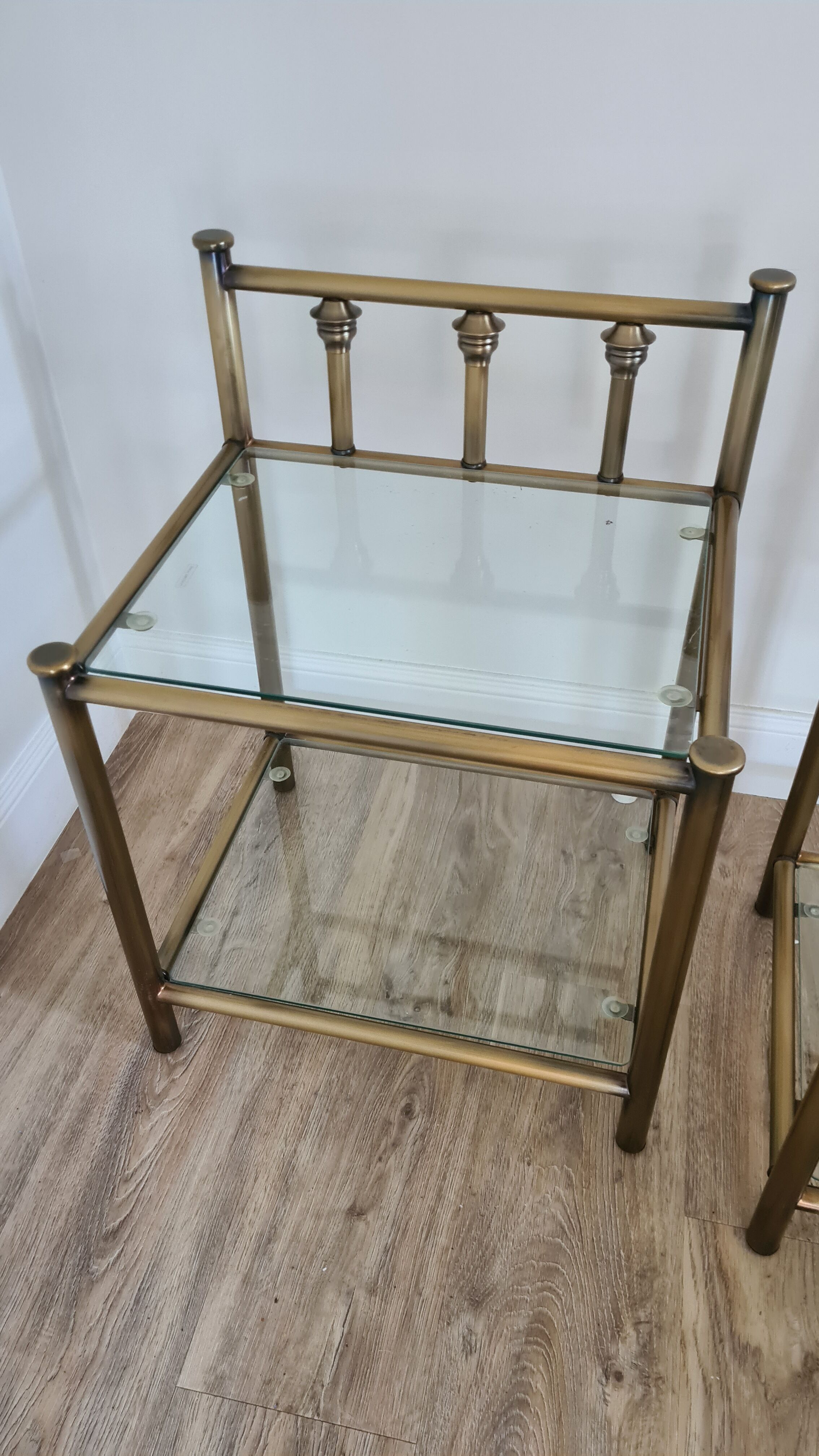 Old pair of glass and brass bedside tables, 80s