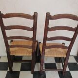Pair of ancient mulched chairs