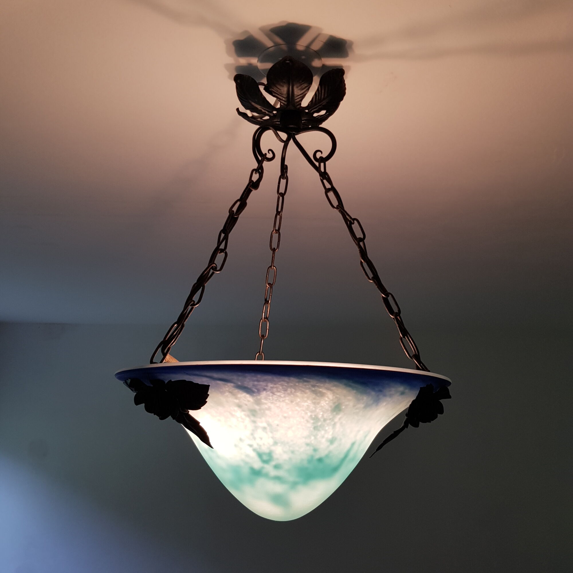 Blue glass paste and wrought iron basin suspension