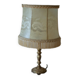 Table lamp with parchment lampshade with braid and fringes