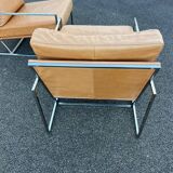 Paire de fauteuils chauffeuses contemporains cuir