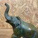 Pair of art deco bookends with elephant decoration in regulated and travertine, vintage