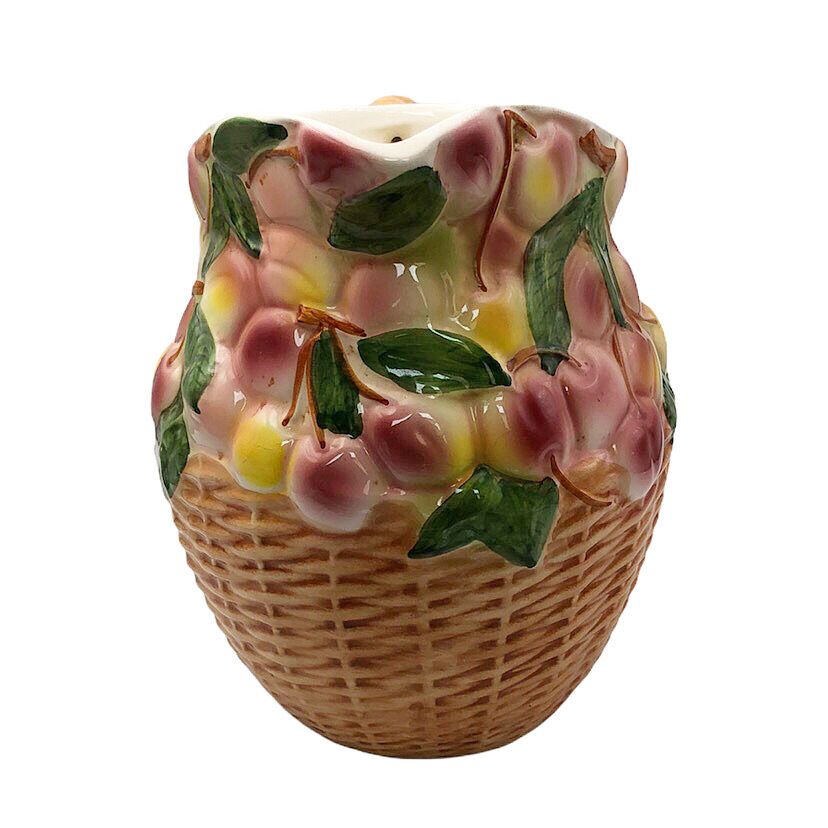 Vintage pitcher in cherry patterned dabbling