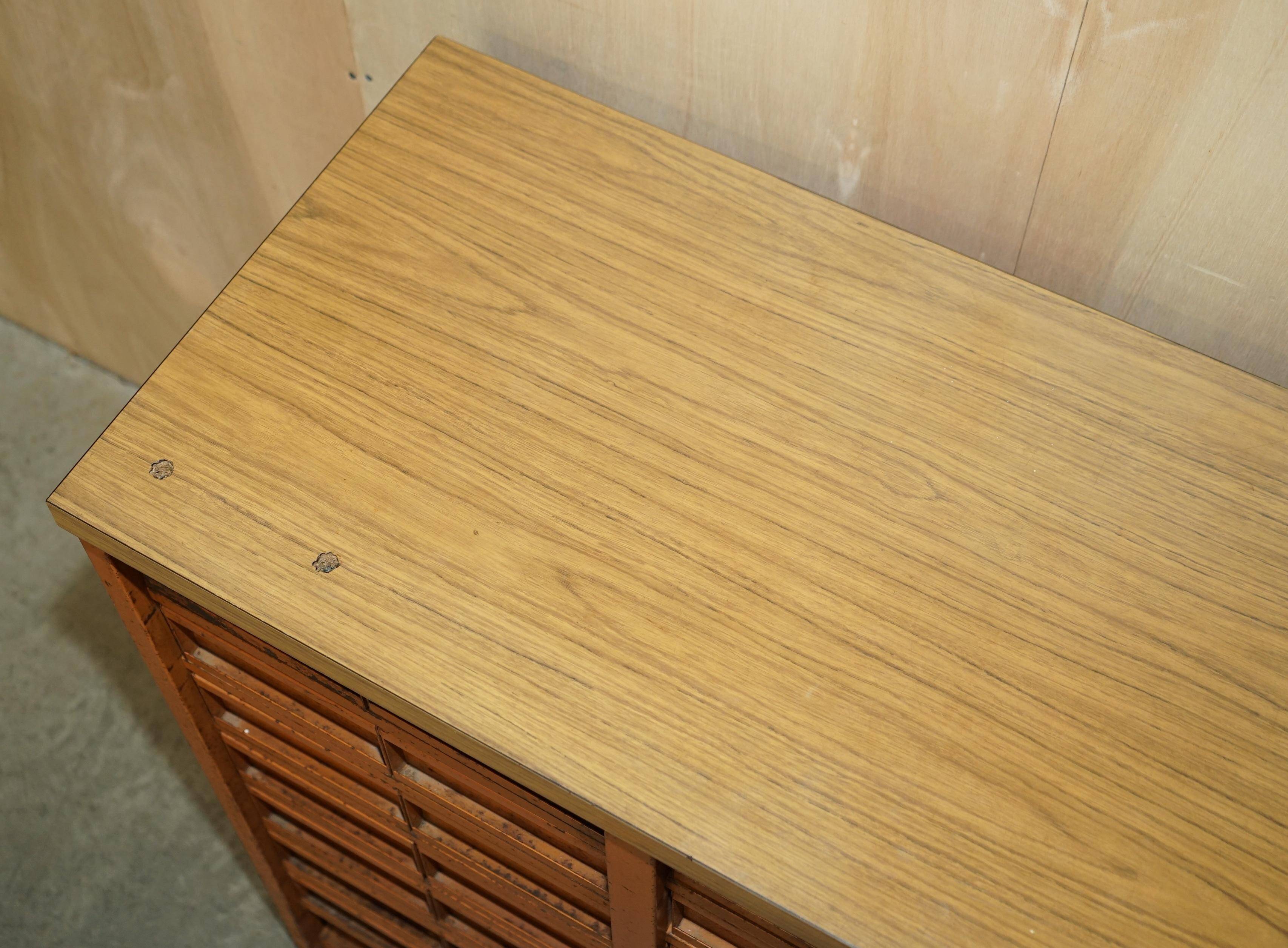 Industrial metal chest of drawers with 30 drawers.
