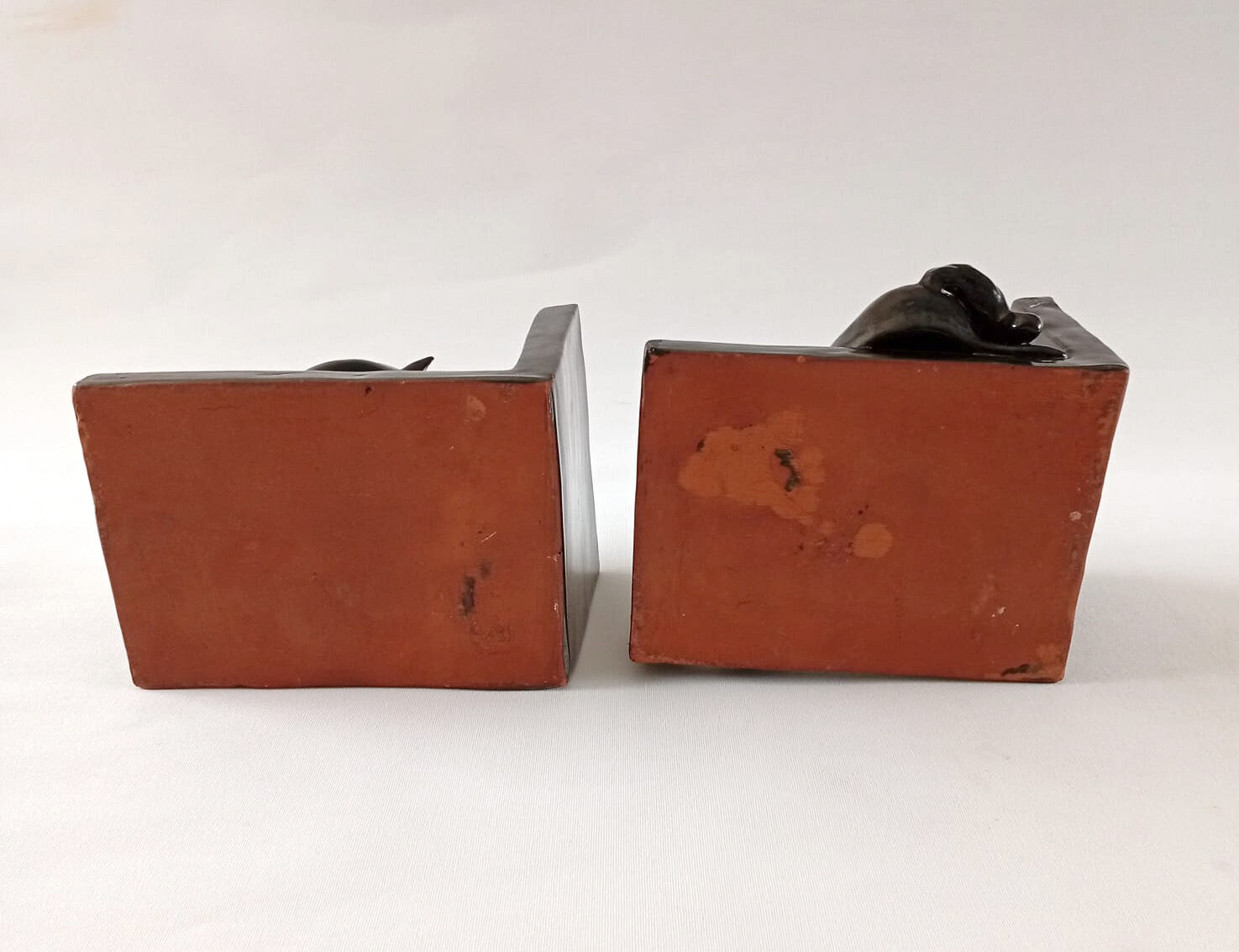 Black ceramic bookends horses