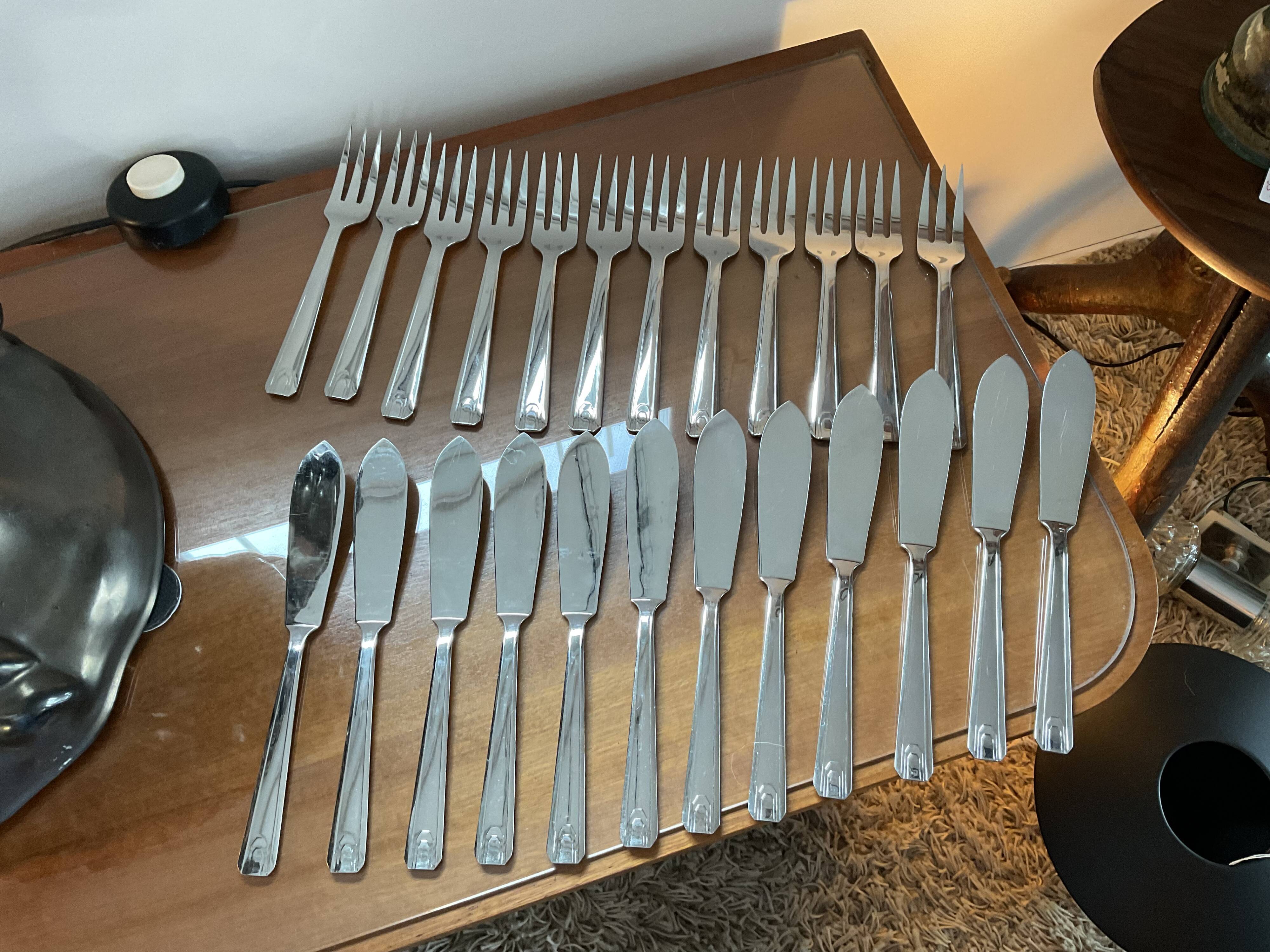 Stainless fish cutlery, 12 knives and 12 forks