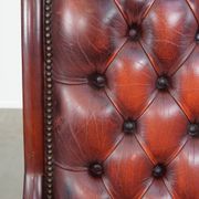 Red cowhide leather English Chesterfield armchair combined with wood