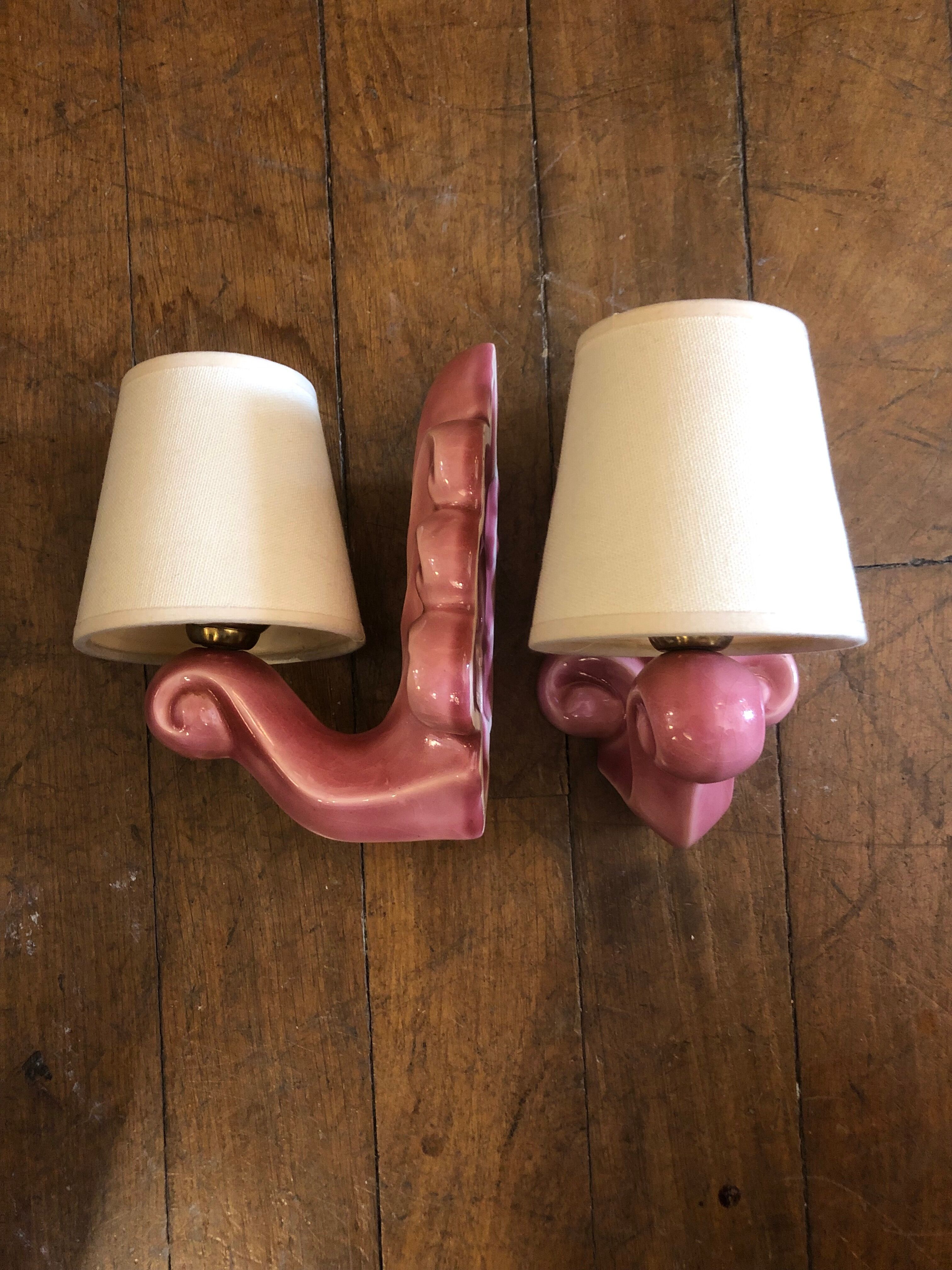 Pair of earthenware palmette wall lamps, 1950s