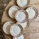 Set of 8 old flat plates in iron earth, decorations of HBC swallows
