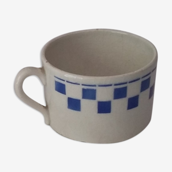 Blue checkerboard cup