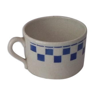 Blue checkerboard cup