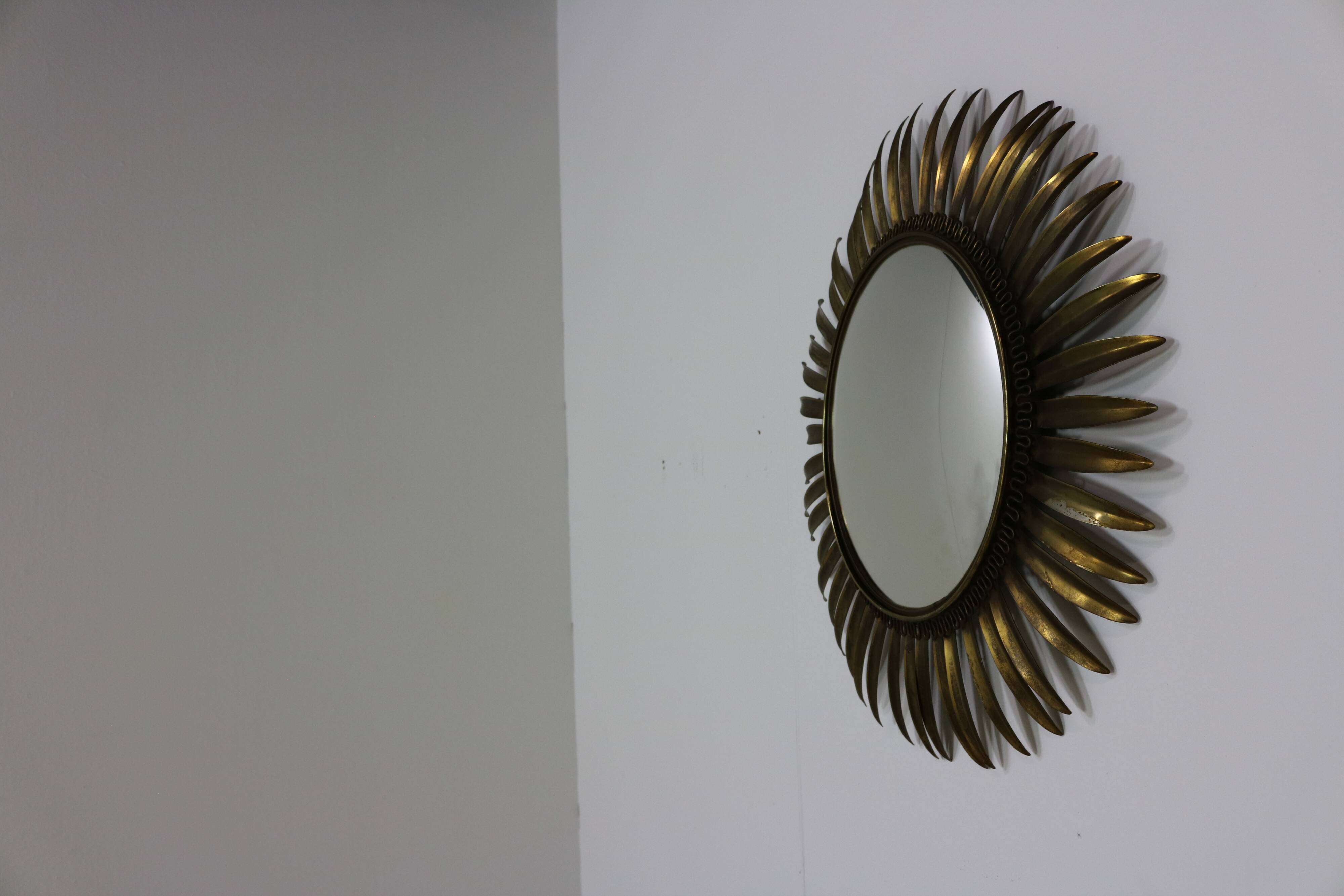 Typical midcentury sunburst wall mirror