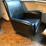 Vintage 60's armchair in black skai.