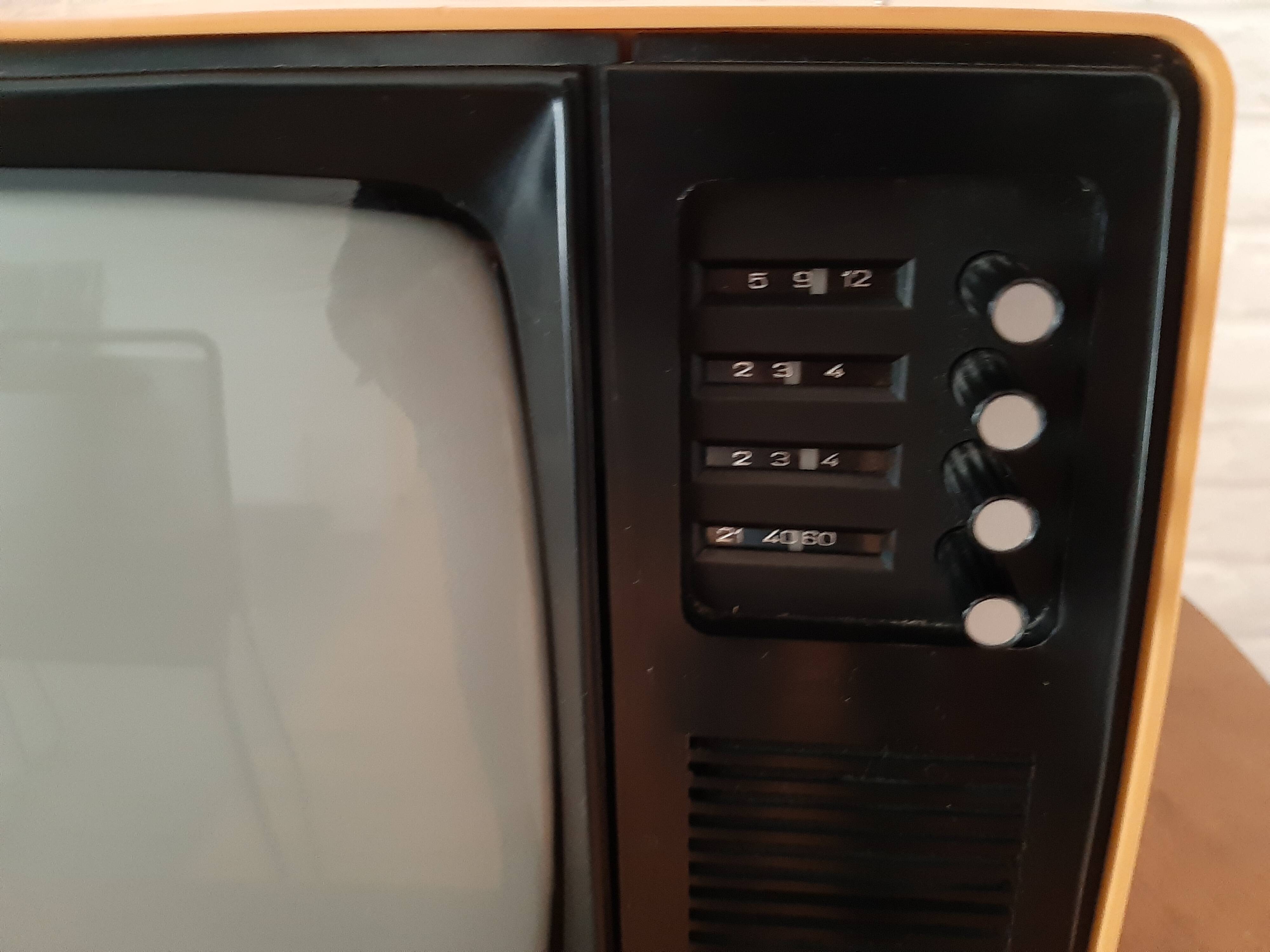 Yellow minivox vintage tv
