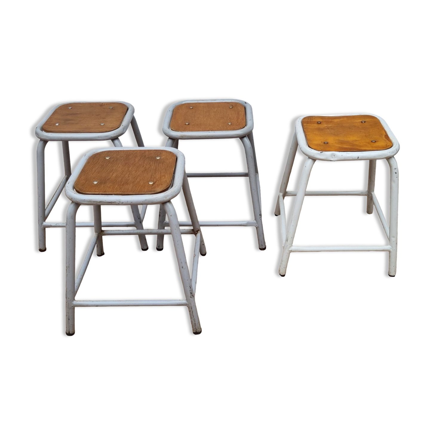 Set of four stackable industrial tubular metal and wood stools