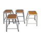 Set of four stackable industrial tubular metal and wood stools