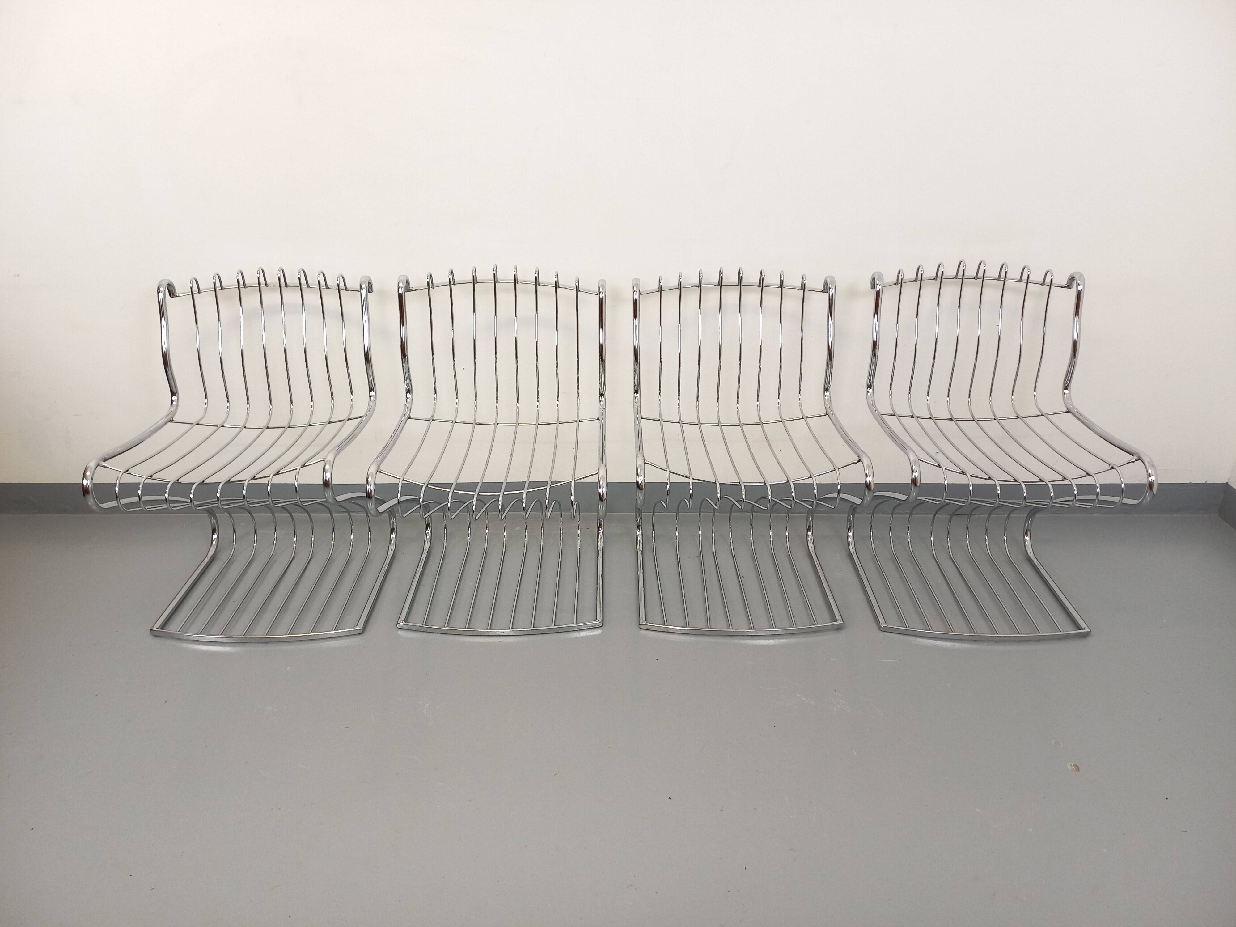 Set of 4 vintage Italian chairs by Gastone Rinaldi in chrome metal.