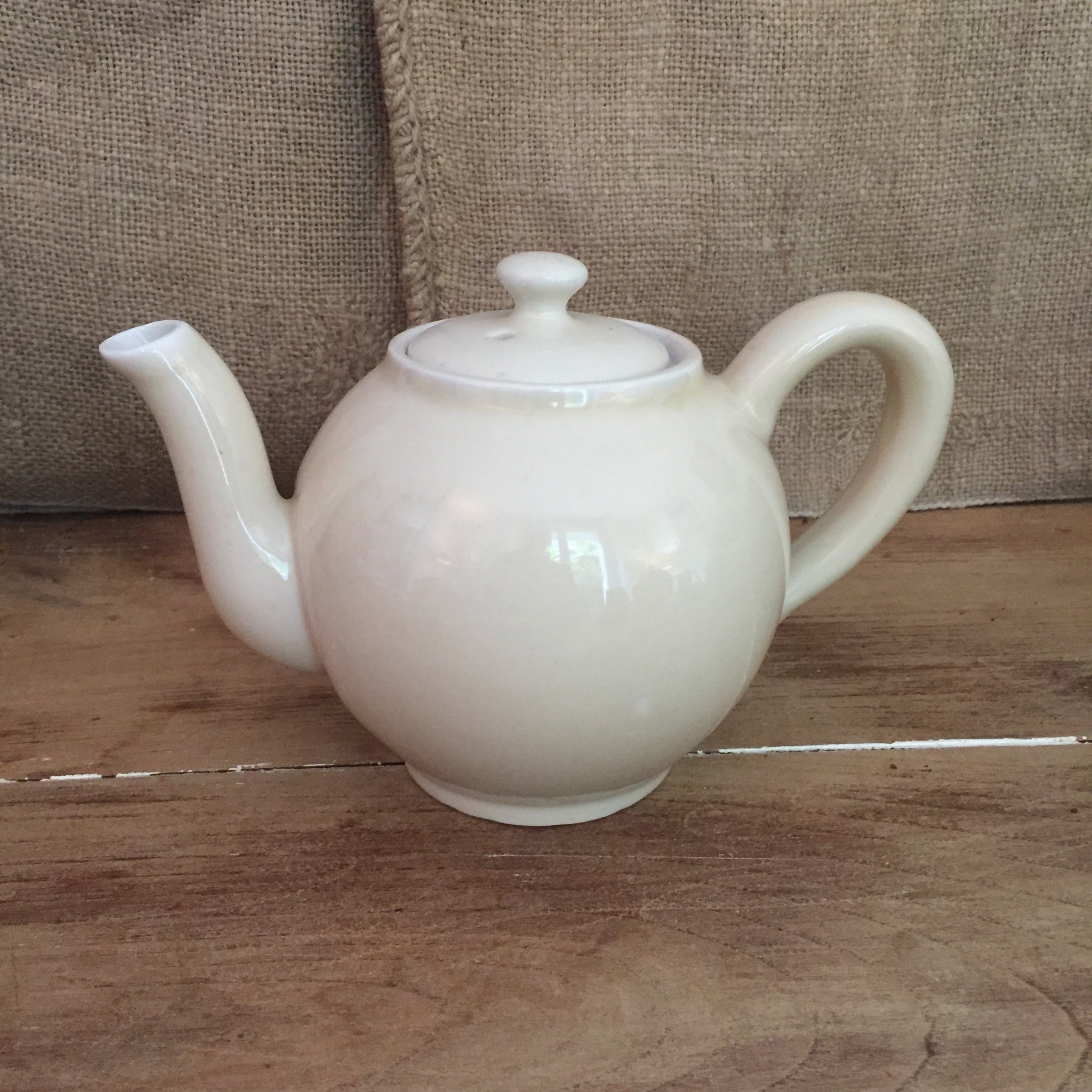 Teapot and vintage milk jar
