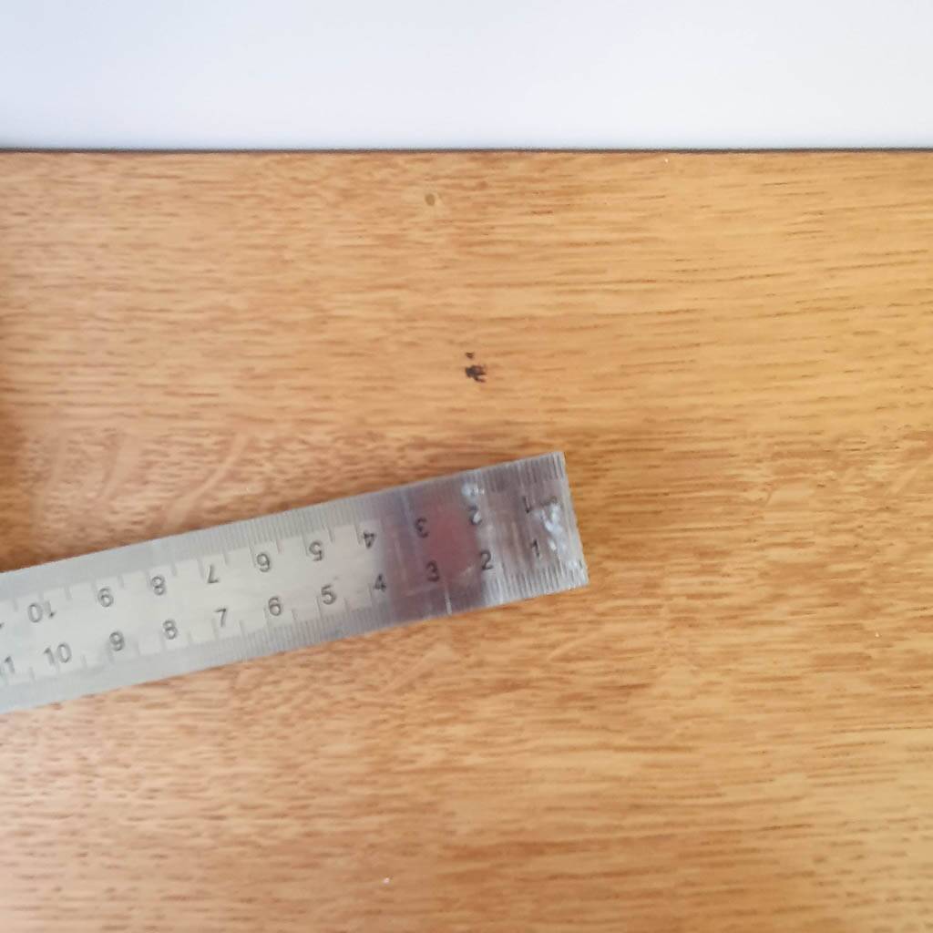 Oak compass foot chest of drawers