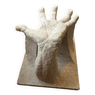 Hand-shaped carved stone coffee table support