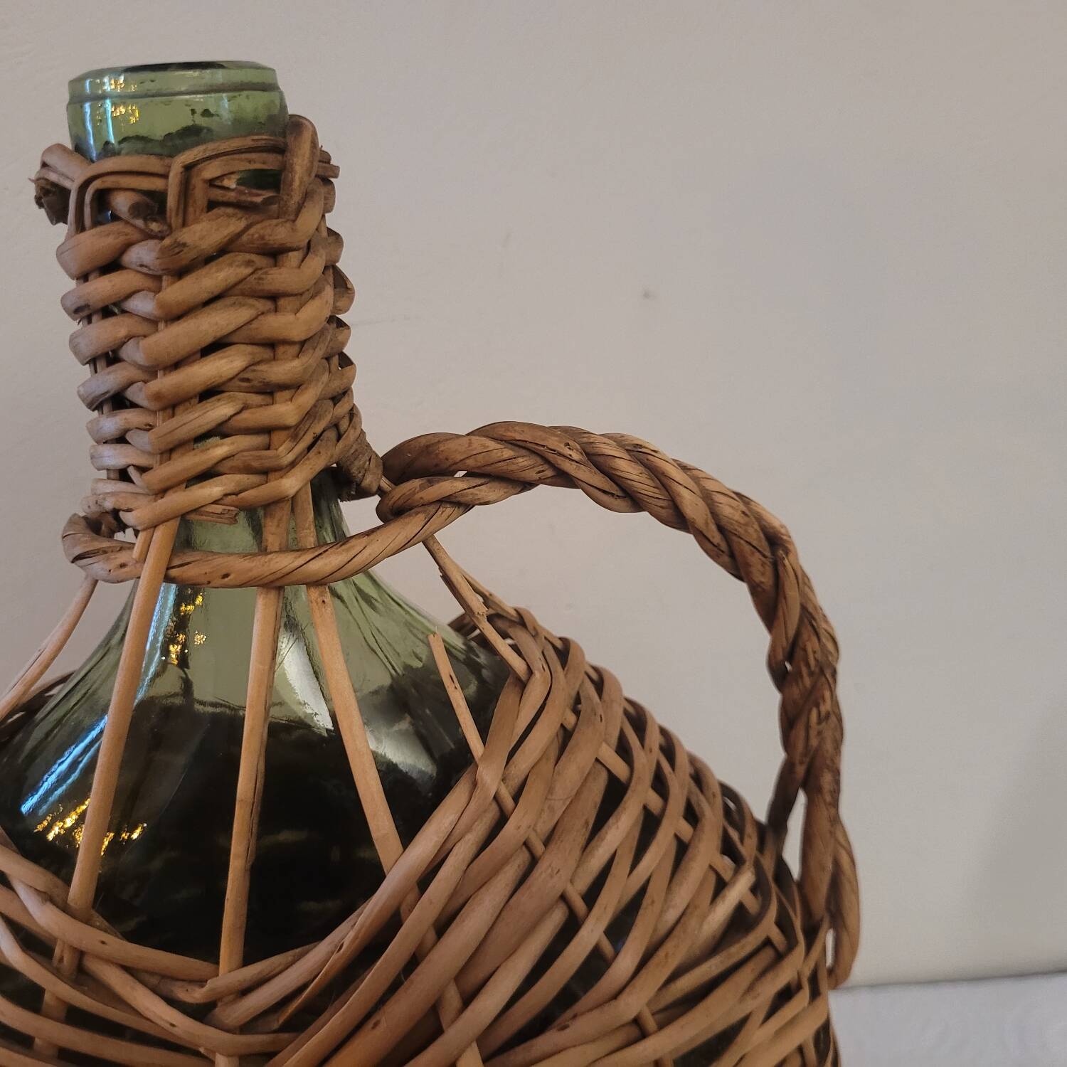 Green glass carafe with wicker covering – 2 litres – 1960s–1970s