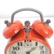Old mechanical alarm clock JAZ CLIBIC - Orange lacquered metal - 1970