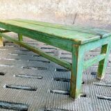 Old wooden bench sidetable green