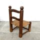 Brutalist chair in wood and straw