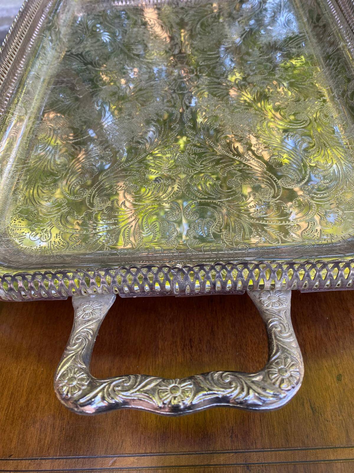 Sculpted silver serving tray