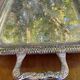 Sculpted silver serving tray